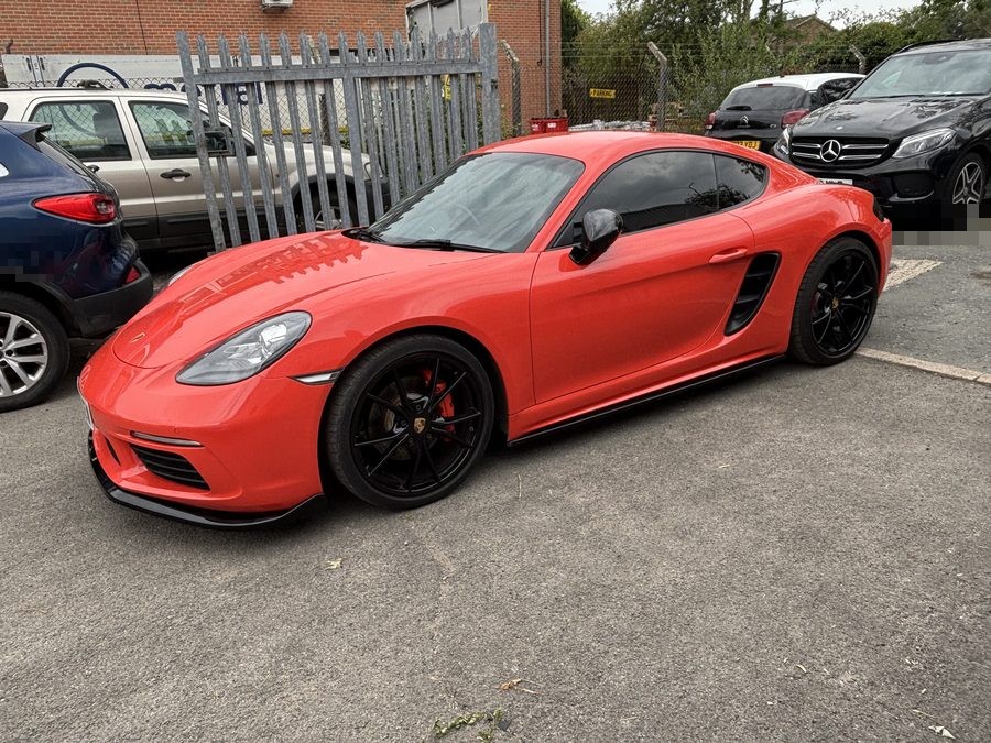 Red Porsche 718 Cayman after accident repair at Crowborough Accident Repair Services